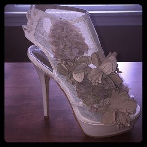 Colin Stuart floral appliqué platform heels.